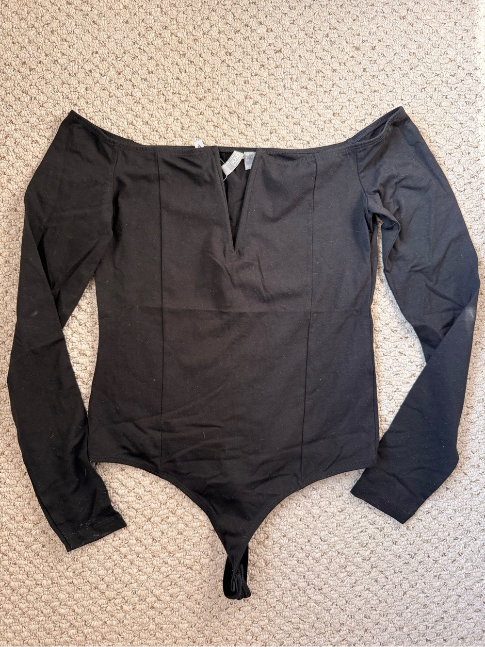 Variety of Bodysuits black and beige/cream
